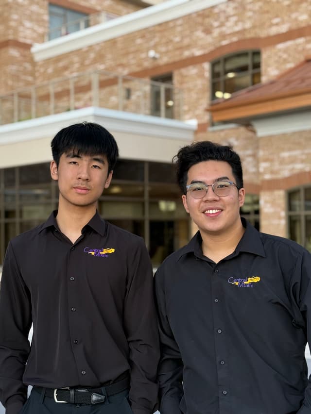Enda Du and Caden Zhang, the Bossa Boys, in performance attire
